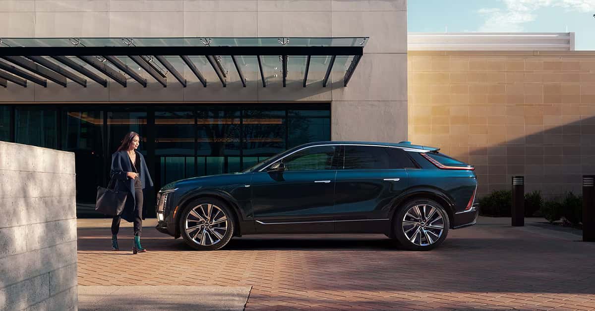 2025 Cadillac Lyriq parked in front of a building
