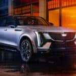 2025 Cadillac Escalade IQ parked in front of a building