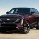 2026 Cadillac ESCALADE IQ in Black Cherry Tintcoat parked in an open area