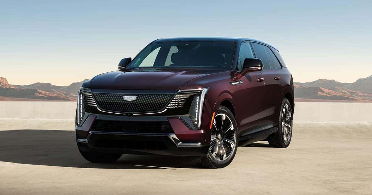 2026 Cadillac ESCALADE IQ in Black Cherry Tintcoat parked in an open area